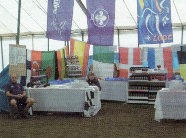 Lots of international flags fly above the camp souvenir shop.