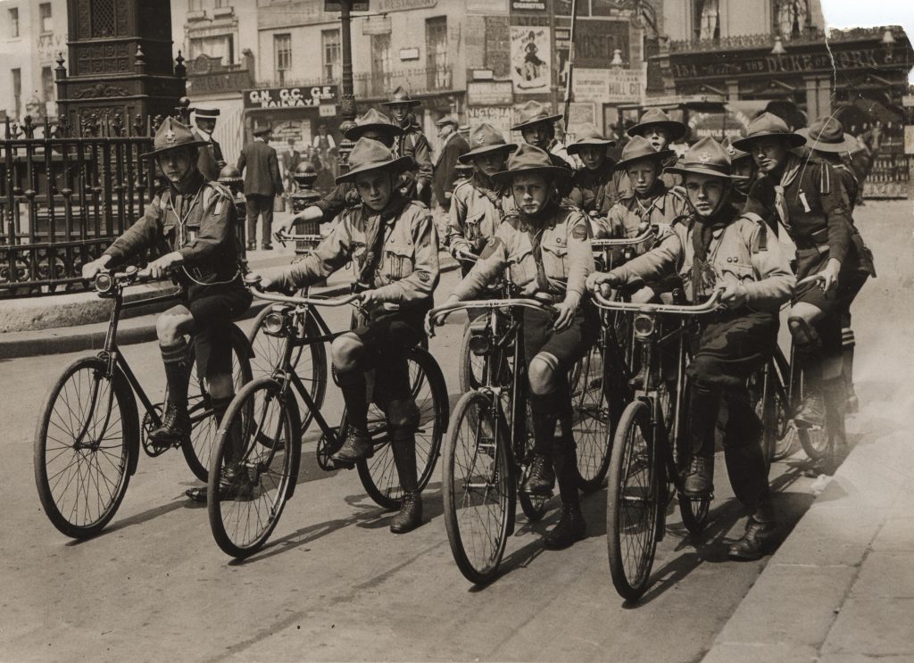 Scouts during the First World War on bicycles delivering messages.
